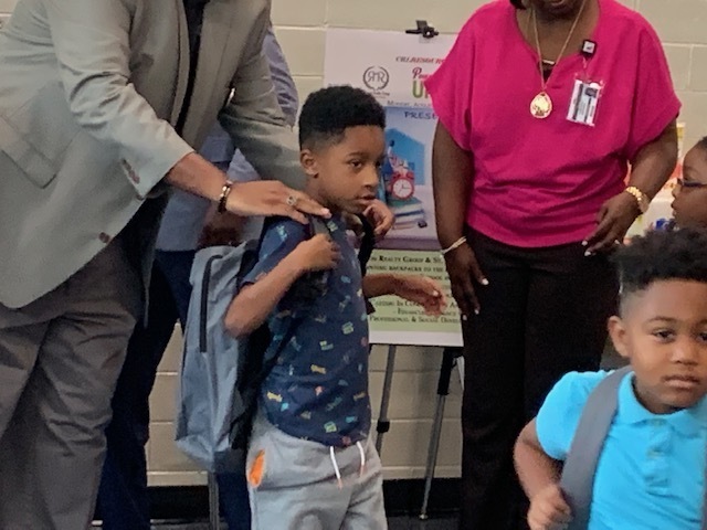 Robinson Elementary 1st grader sports new backpack